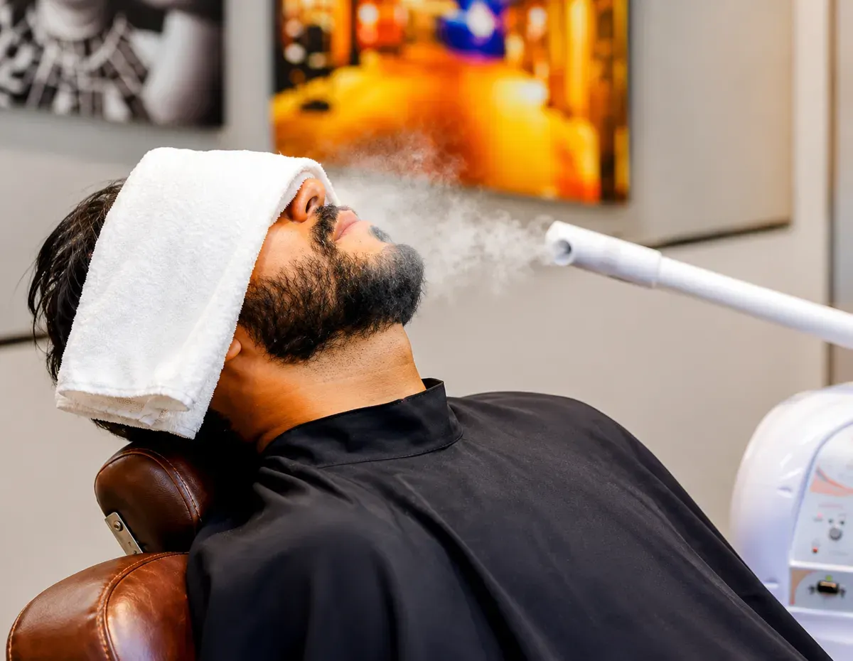 Barboterapia com toalha quente na Barbearia Executive